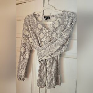 Gray and white sweater